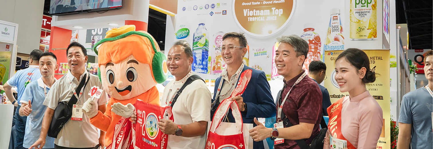 RITA team welcoming partners at a beverage exhibition
